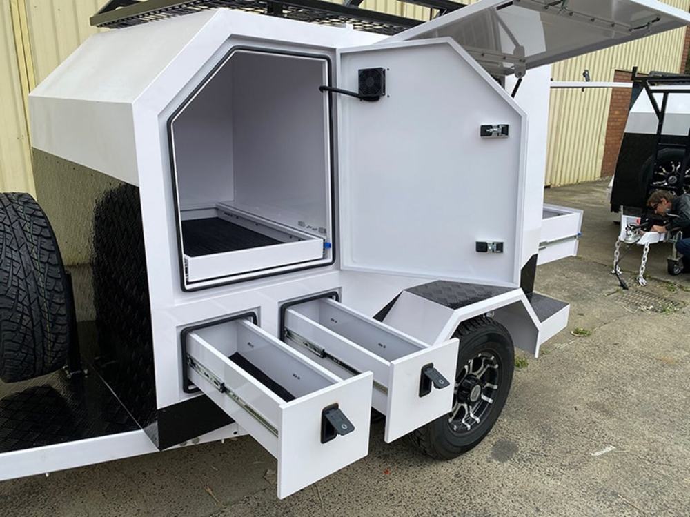 Tradie trailer with hatch and drawers open showing the full fit out